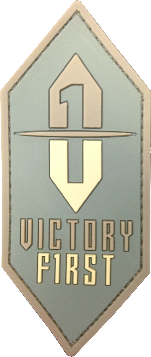 Victory First Logo Patch in subdued earth tones for lower profile while wearing earth tones or various military colors, such as; Multicam® Coyote, Desert Sand, or Olive Drab. Patch made of soft 3D PVC in 3 colors, with Velcro hook backing. Made in the USA